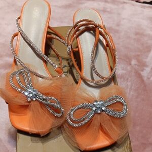 Orange High-Heeled Sandals with Bow Embellishment